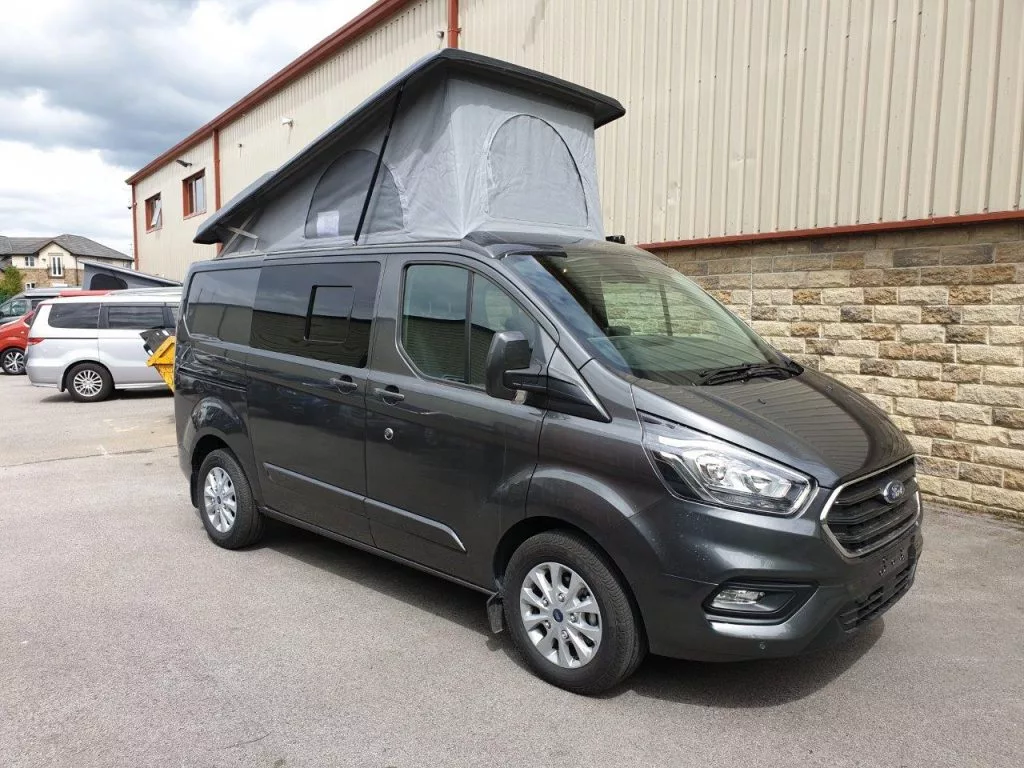 Wellhouse offers the Le-Tour with both the pictured pop-up roof and high roof