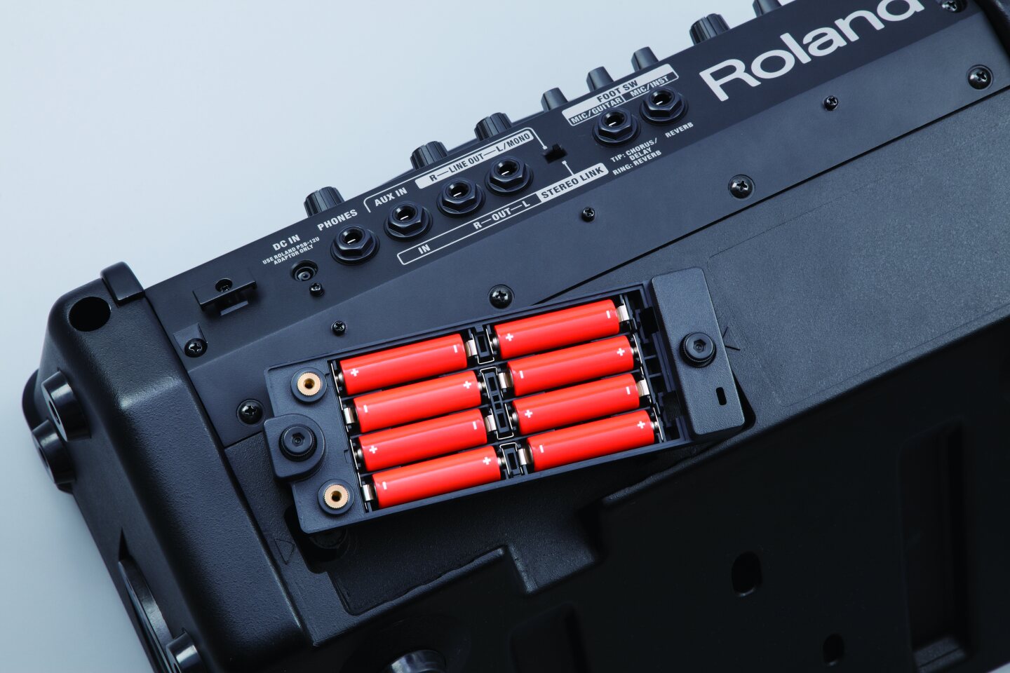 The Eco (10 W) mode promises up to 20 hours of outlet-free play from eight AA-sized Ni-MH batteries