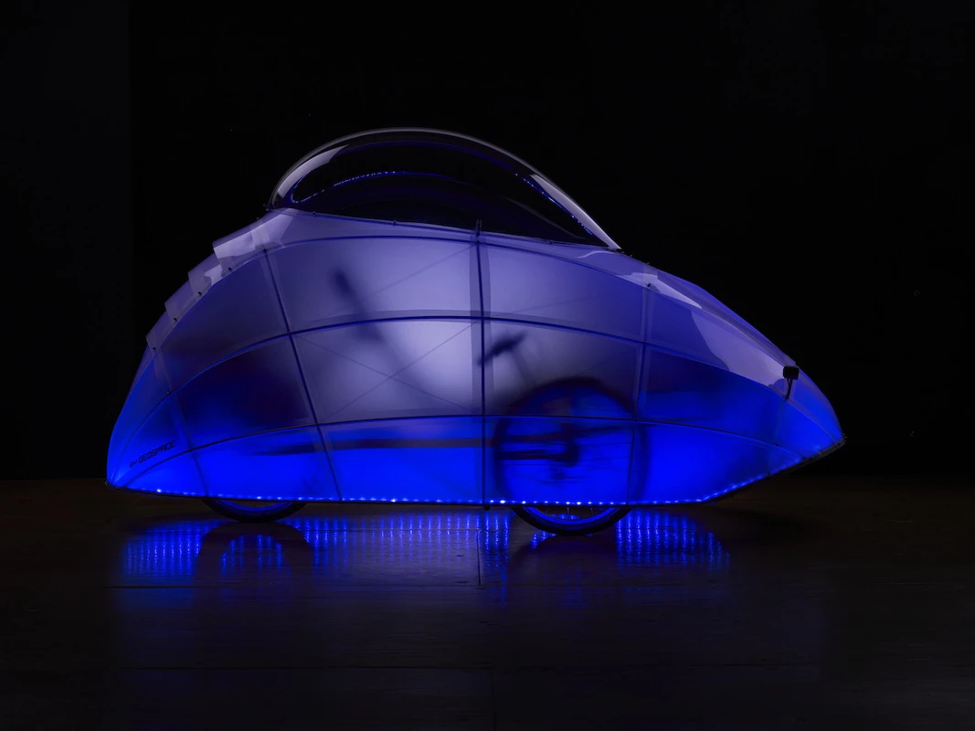 The FireFly recumbent tricycle outfitted with an LED-lit dome