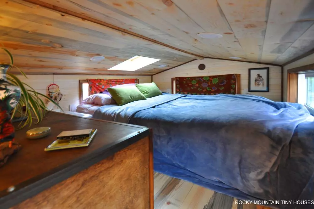 The master bedroom in the Red Mountain 34' Tiny House