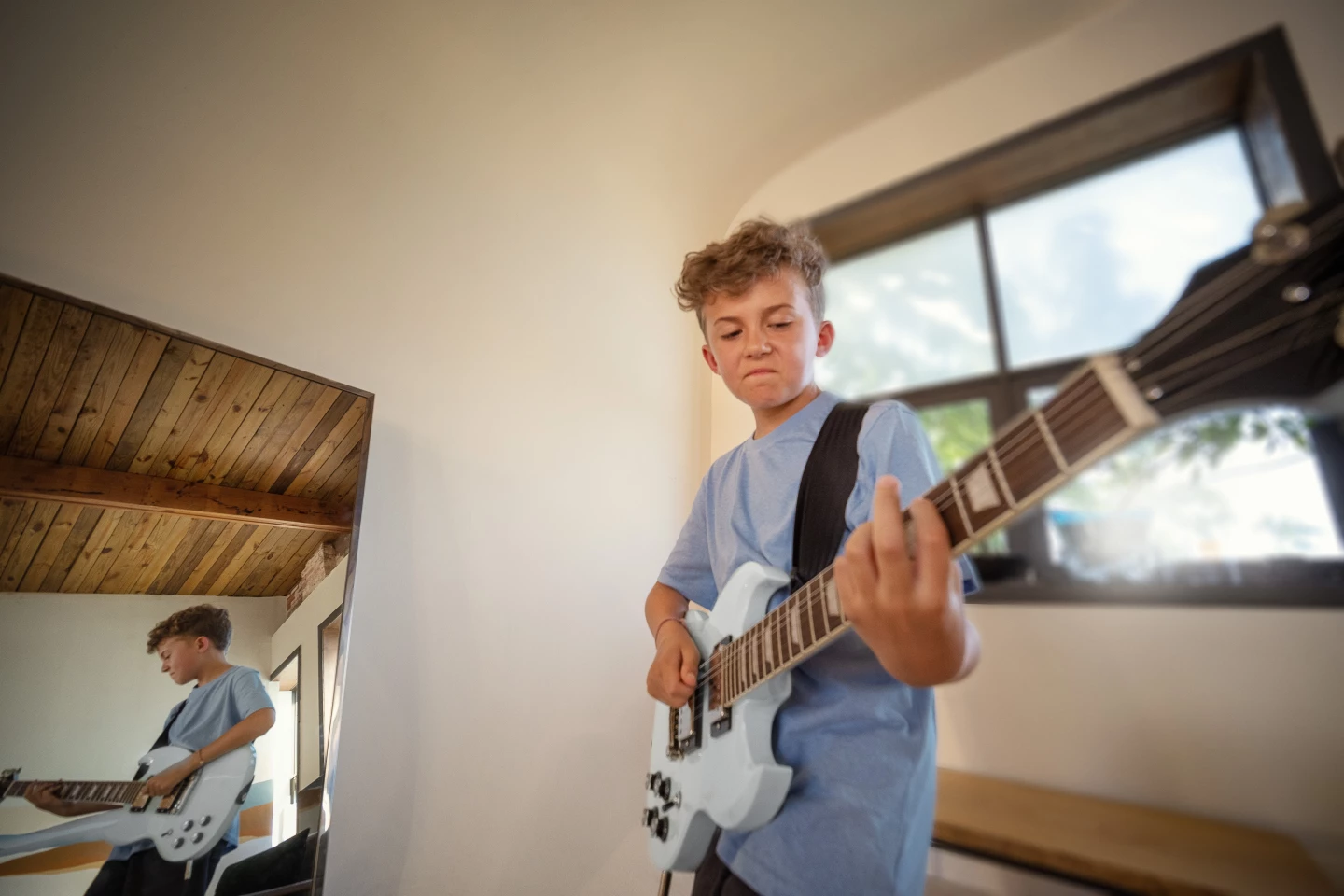 The next Angus Young? The Power Players Collection Les Paul and SG are designed to be a better "first guitar" fit for youthful learners