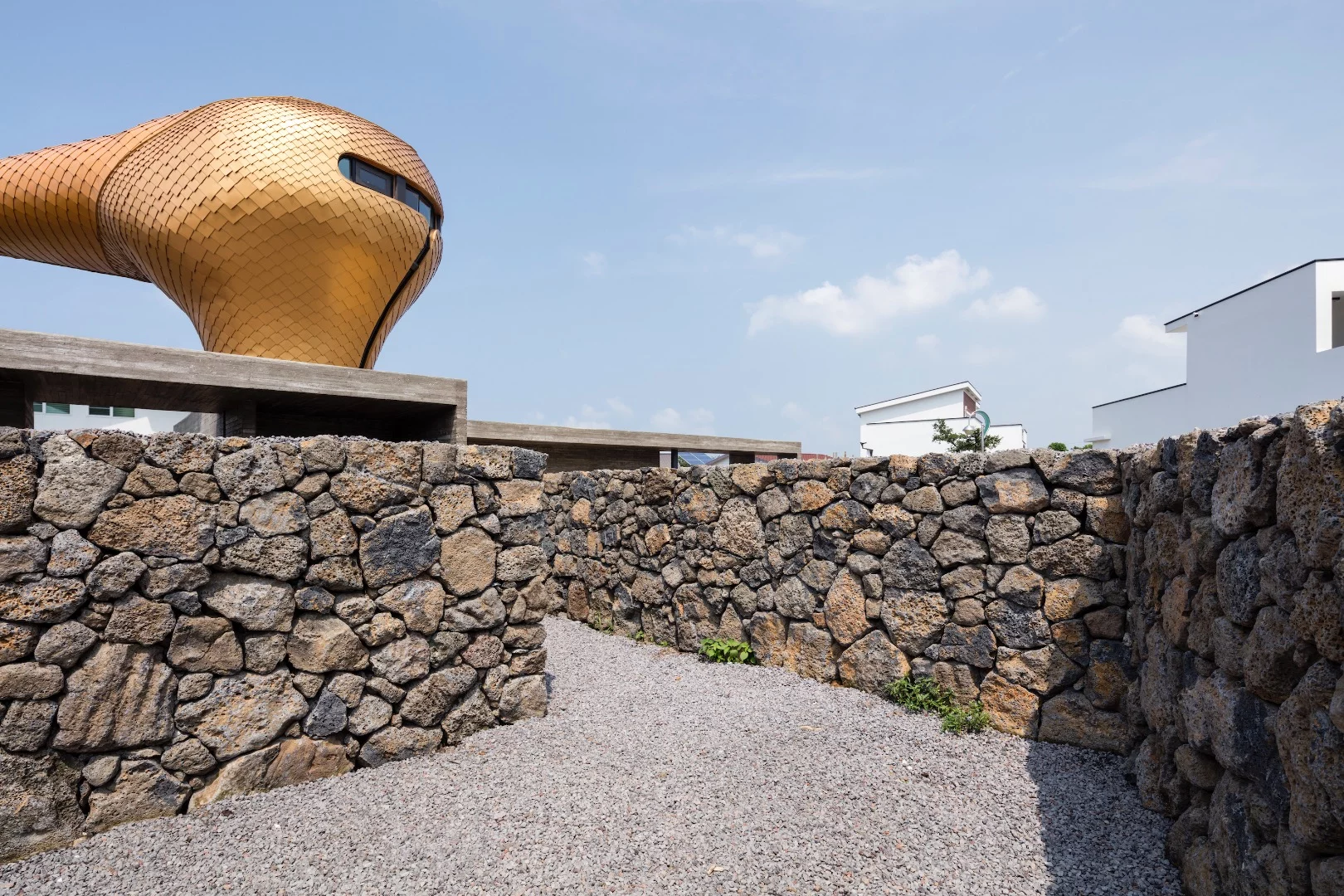 Volcanic rock was used to blend in with the local architecture
