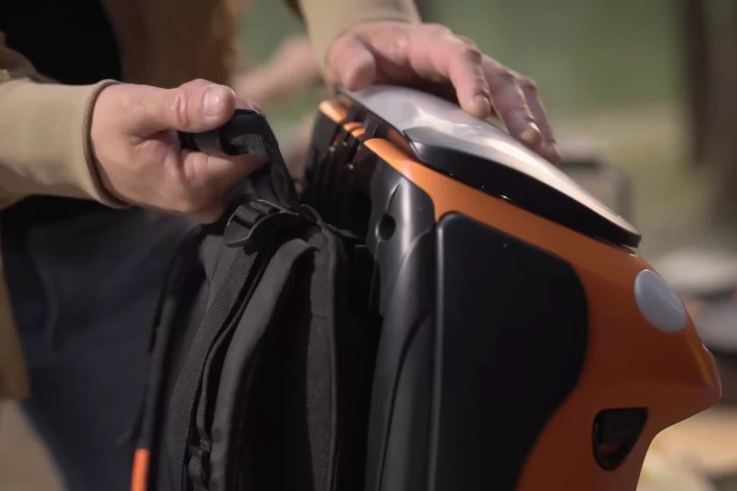 A daypack can be detached from the underside of the Hikerpower