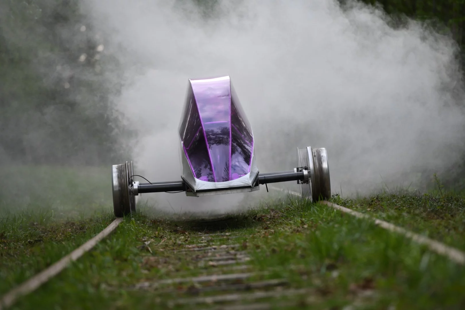 The Eximus IV neither makes steam nor does burnouts, but hey, this sure is a dramatic photo of the world's most efficient vehicle