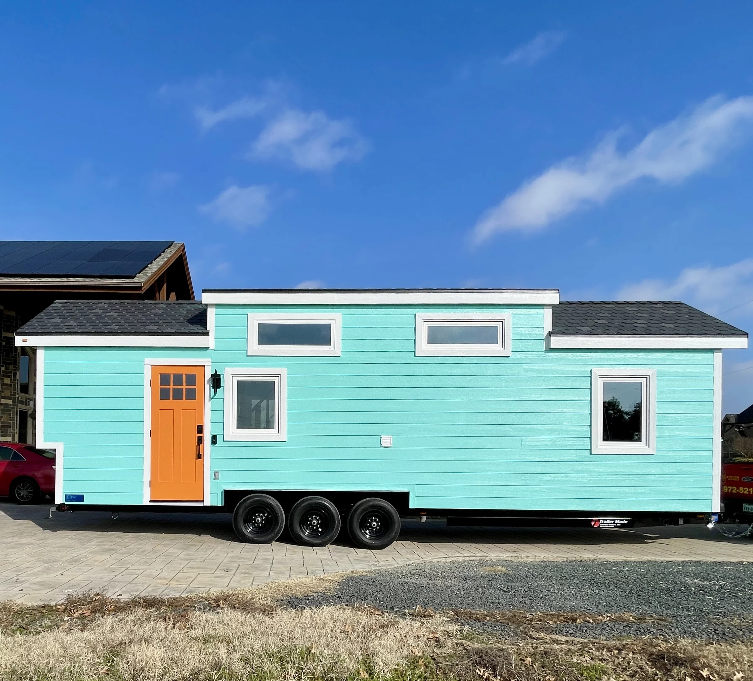 The Lady Bird has a length of 32 ft (9.75 m) and features a space-saving interior that fits both a downstairs master bedroom and a loft