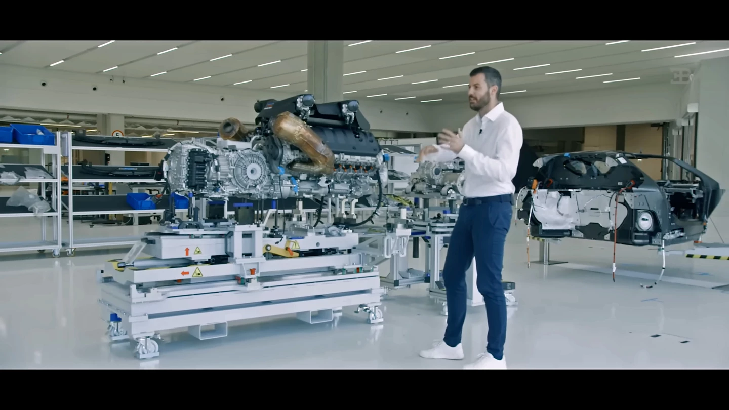 The entire engine, transmission, and electric motor. It's significantly lighter than the W16 with transmission
