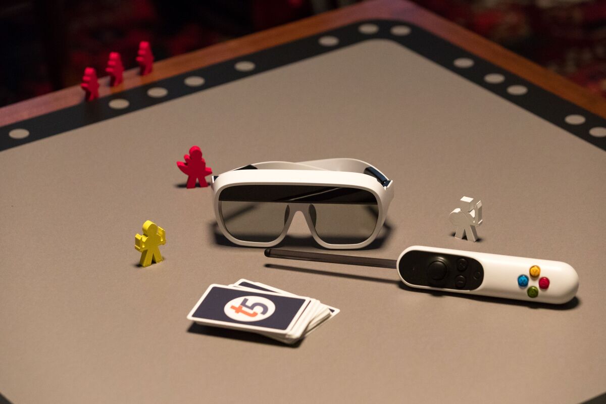 The Tilt Five system includes AR glasses, and a wand controller