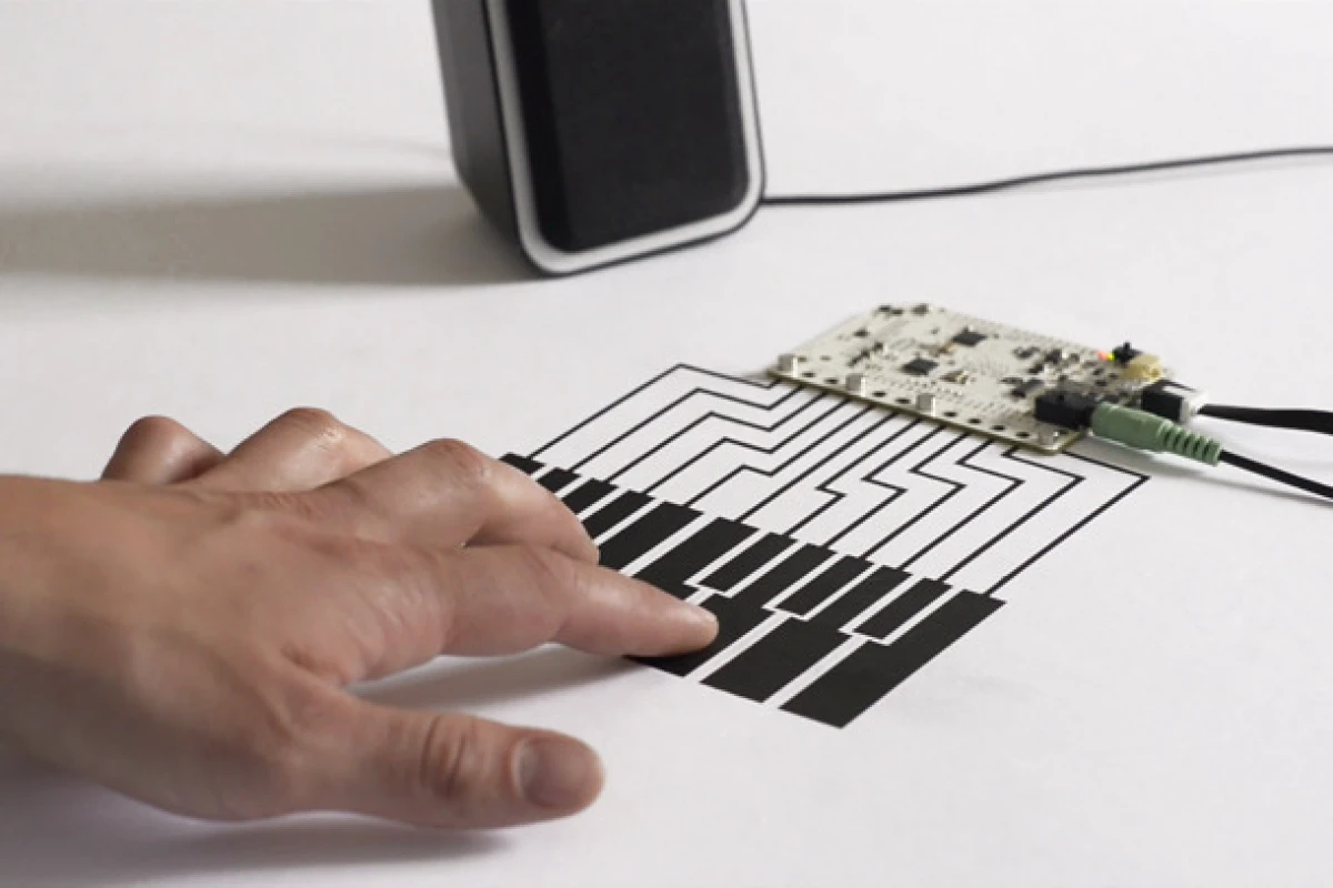Touch Board turns any conductive material into a potential capacitive touch input, like this "piano"