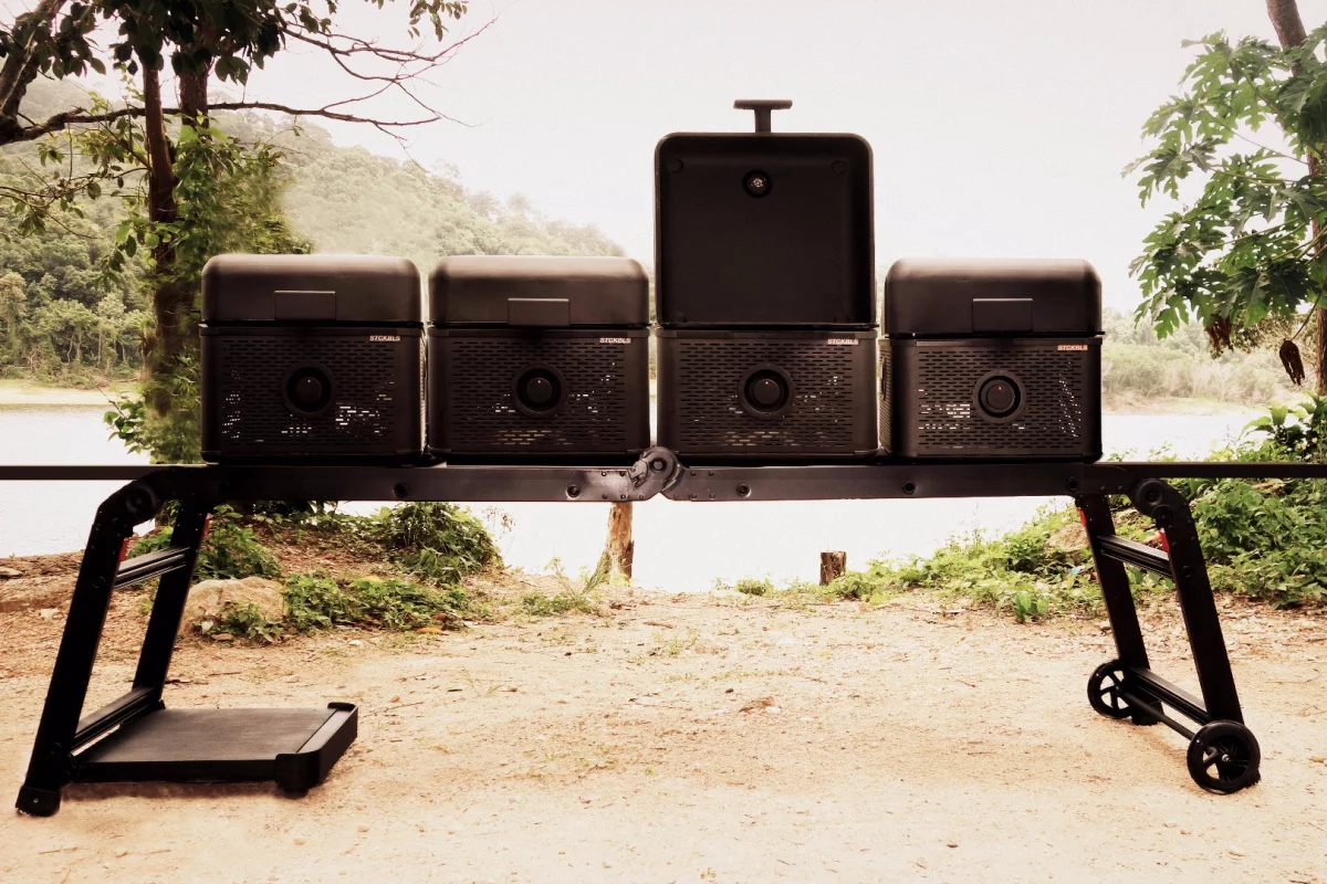 The available grill cart/stand lets you drop four grills next to each other and grill up a feast