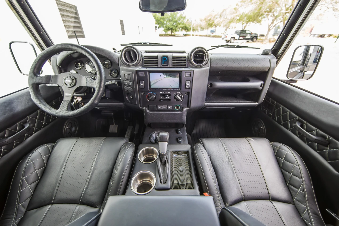 East Coast Defender has thoroughly upgraded the interior, adding leather, a full infotainment system, upgraded gauges and more