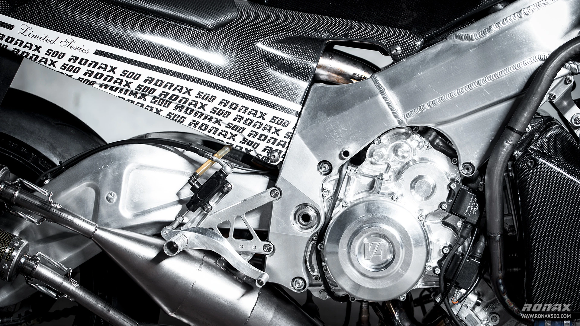 The aluminum engine cases house two counter-rotating crankshafts