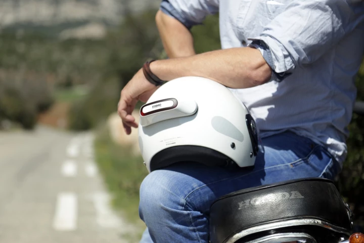 The Cosmo Connected smart brake light is designed to fit most helmets