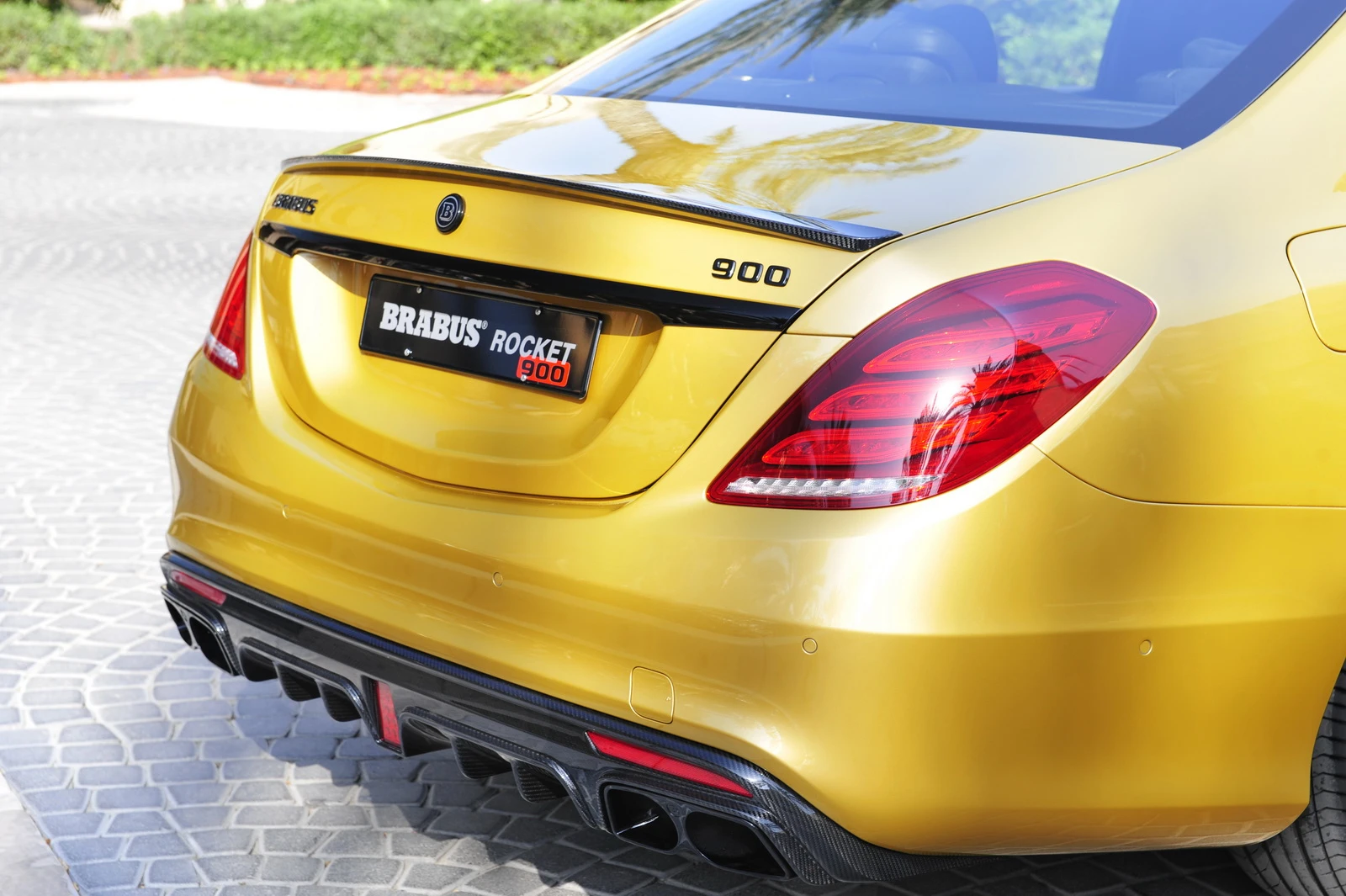 The rear spoiler is carbon fiber and designed to stabilize the vehicle at high speeds