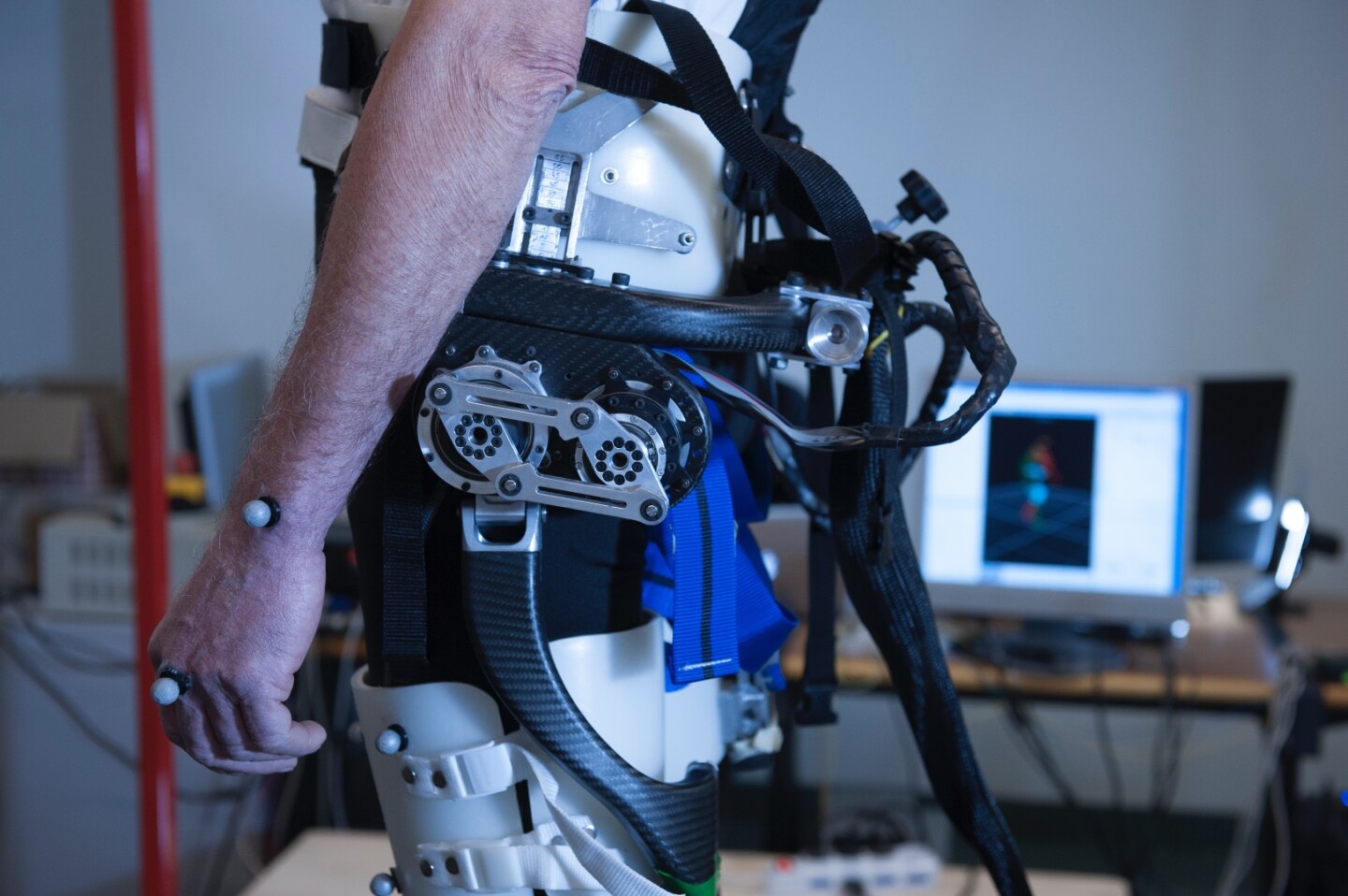 A close up revealing the currently bulky mechanics of the exoskeleton
