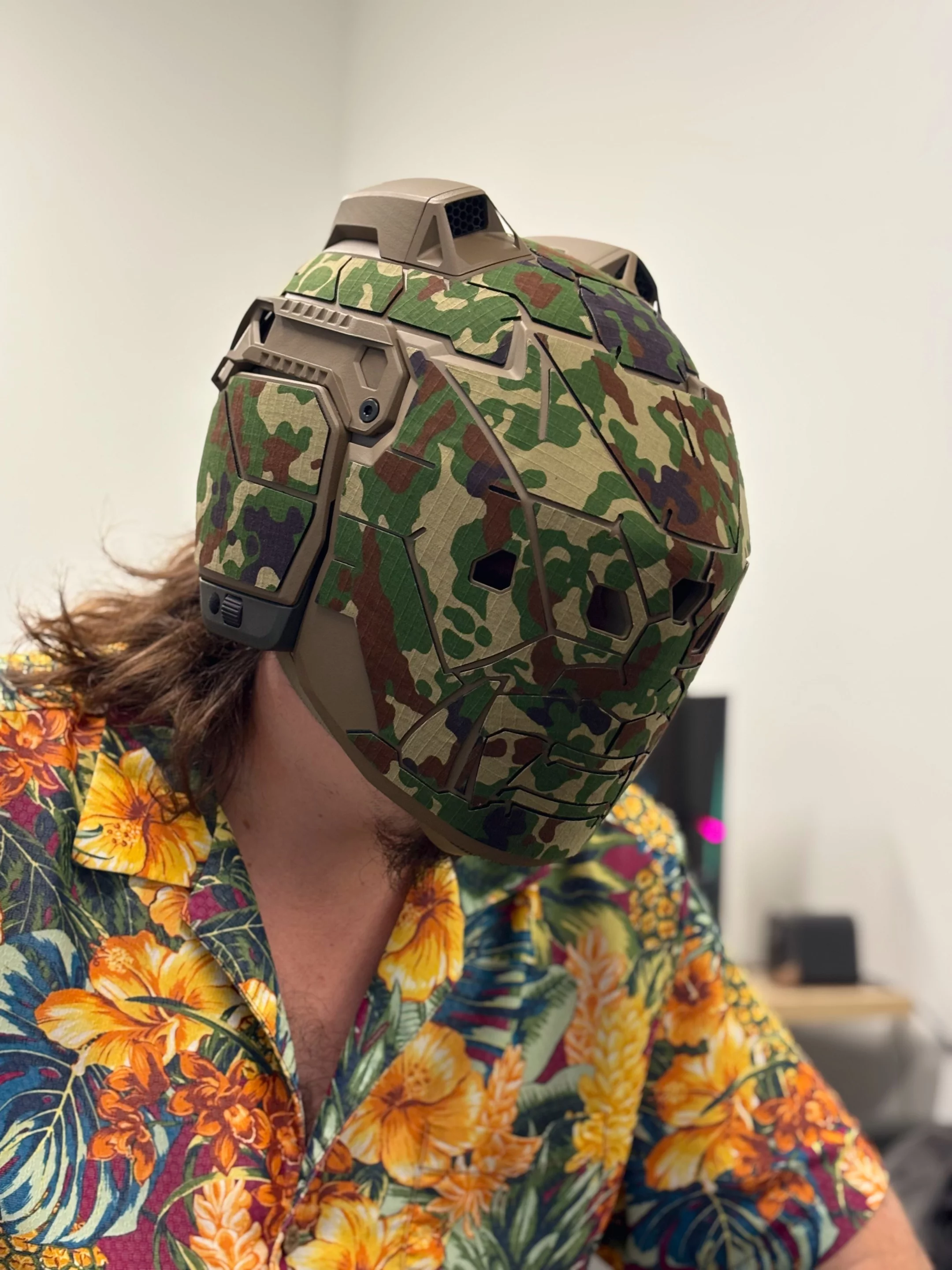 Anduril founder wearing the full ballistic face shield
