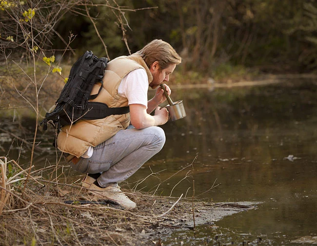 The NDūR Survival Straw filters out nasties from dirty water as you drink