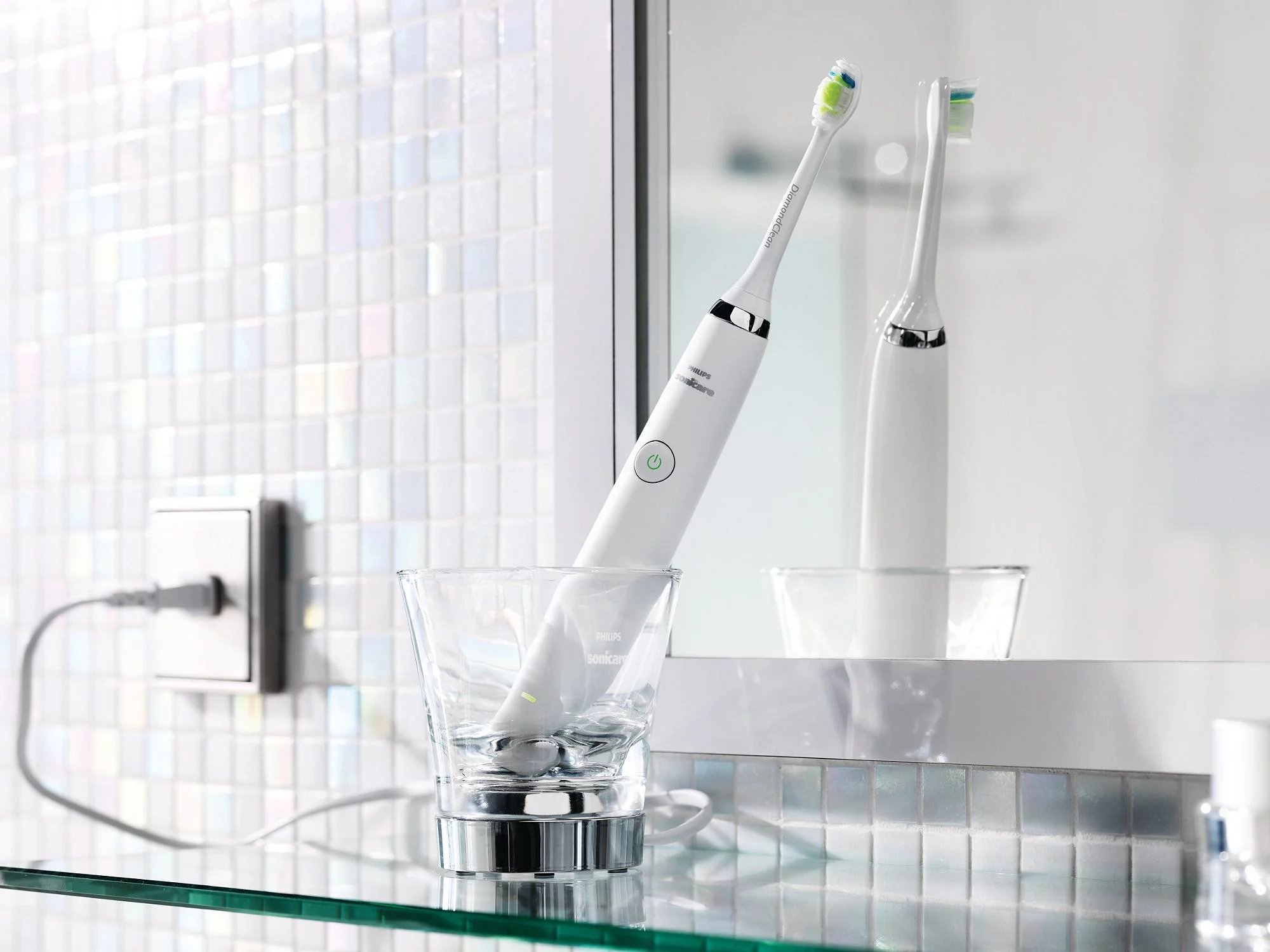 The Philips Sonicare DiamondClean Toothbrush charges via rinsing glass