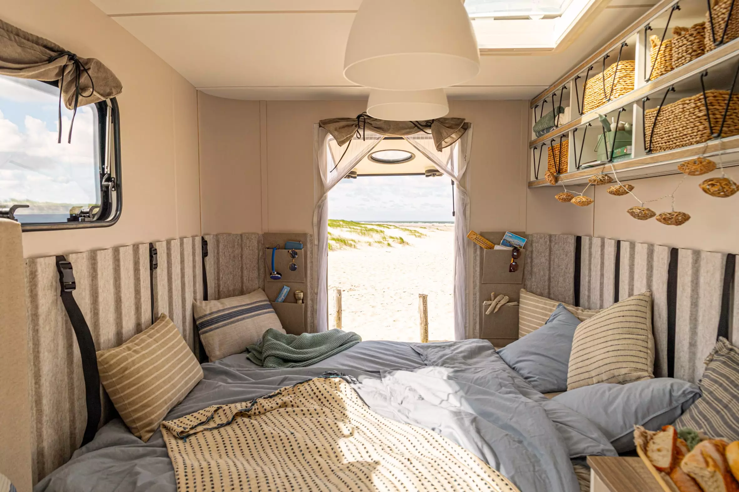 A cozy oceanside bed to retire to after a day in the water