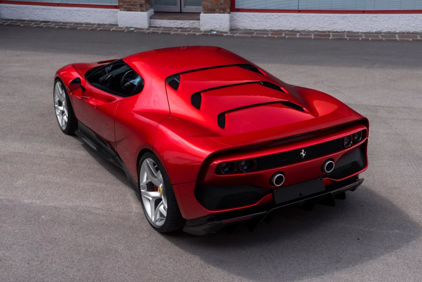 The Ferrari SP38 is finished in a new three-layer metallic red
