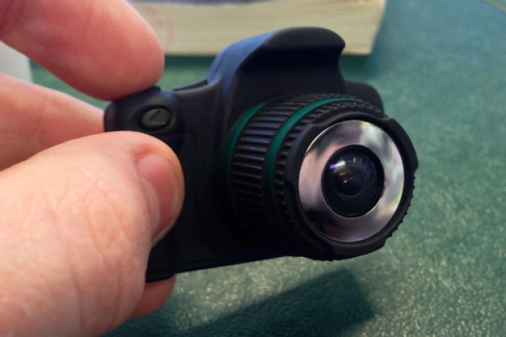 Pressing and holding the power button on the top brings the camera to life and it goes straight into HD video mode