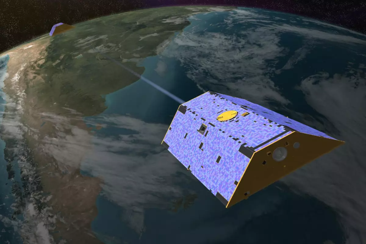 Artist's concept of the twin Gravity Recovery and Climate Experiment (GRACE) satellites in orbit