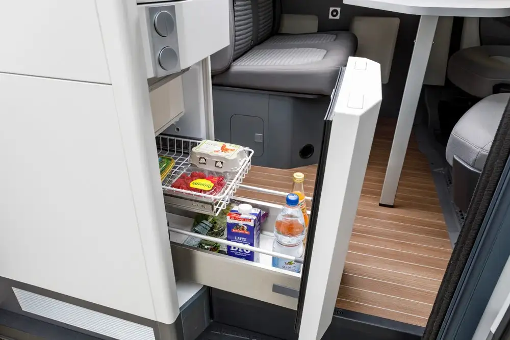 Indoor/outdoor-access slide-out fridge on the VW Grand California
