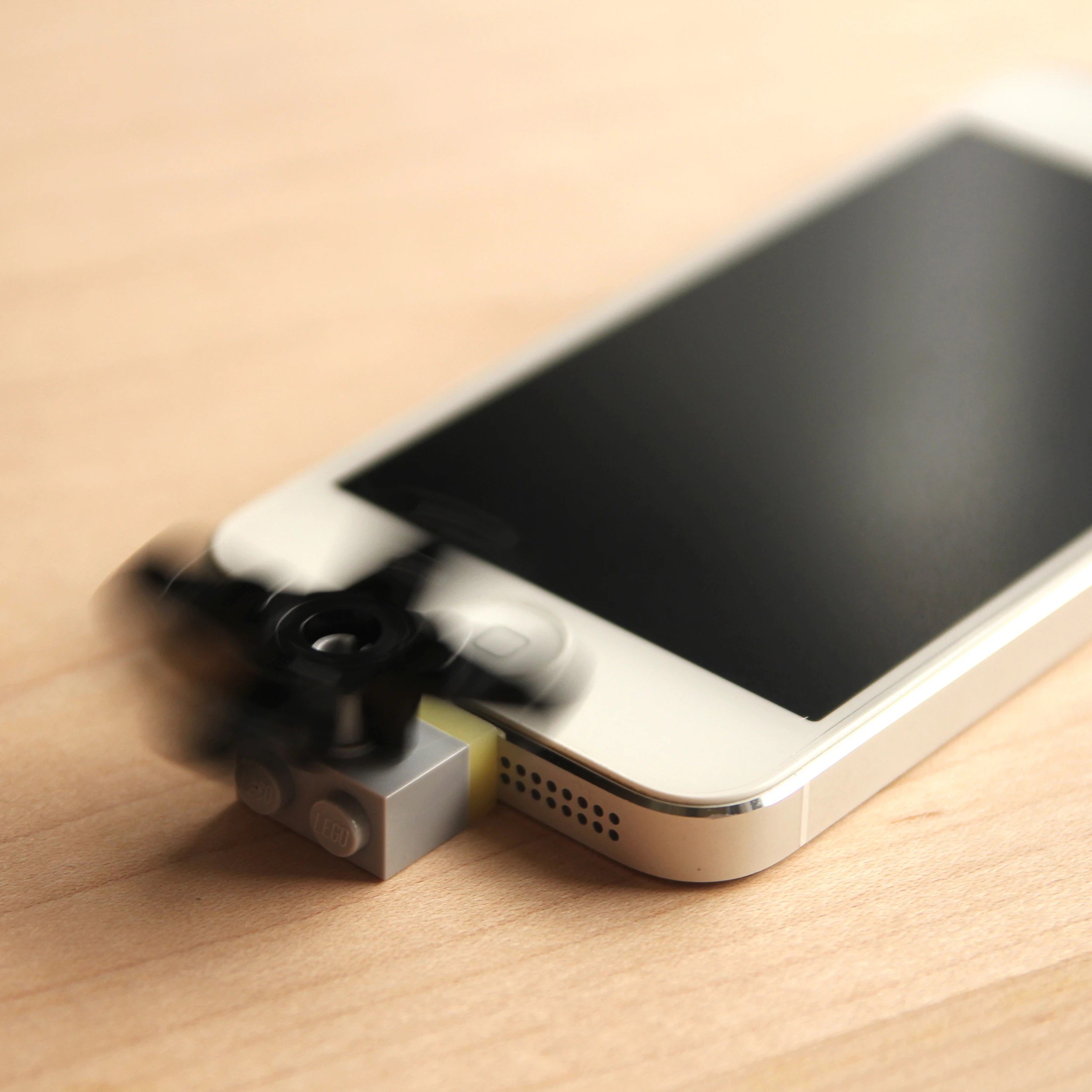 KB's Brick Lightning Cap which will connect Lightning iPhones and iPads to standard Lego bricks
