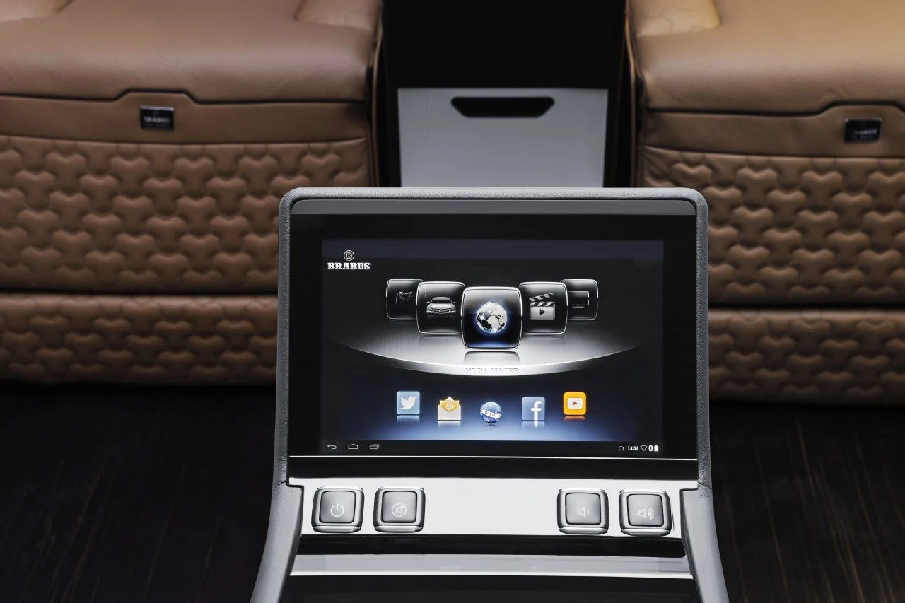 The rear-facing seats can't comfortably view the 42-in TV, so they get their own 10-in display