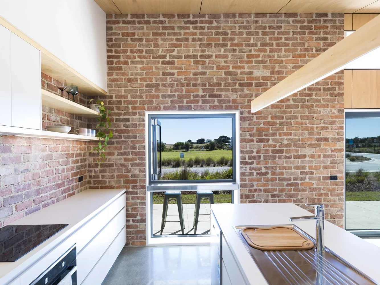 The kitchen opens up to the outdoors