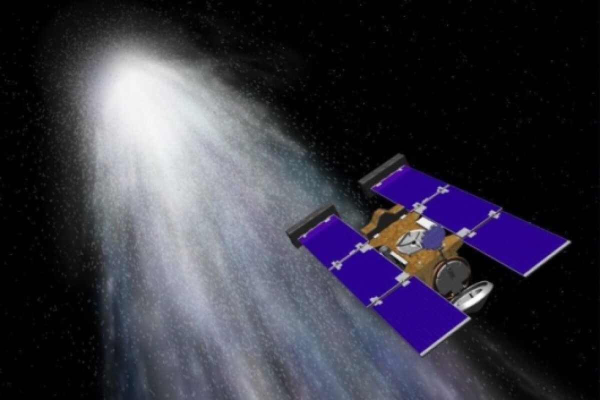 Artist’s conception of Stardust flying through gas and dust from comet Wild 2 (Image: NASA/JPL)