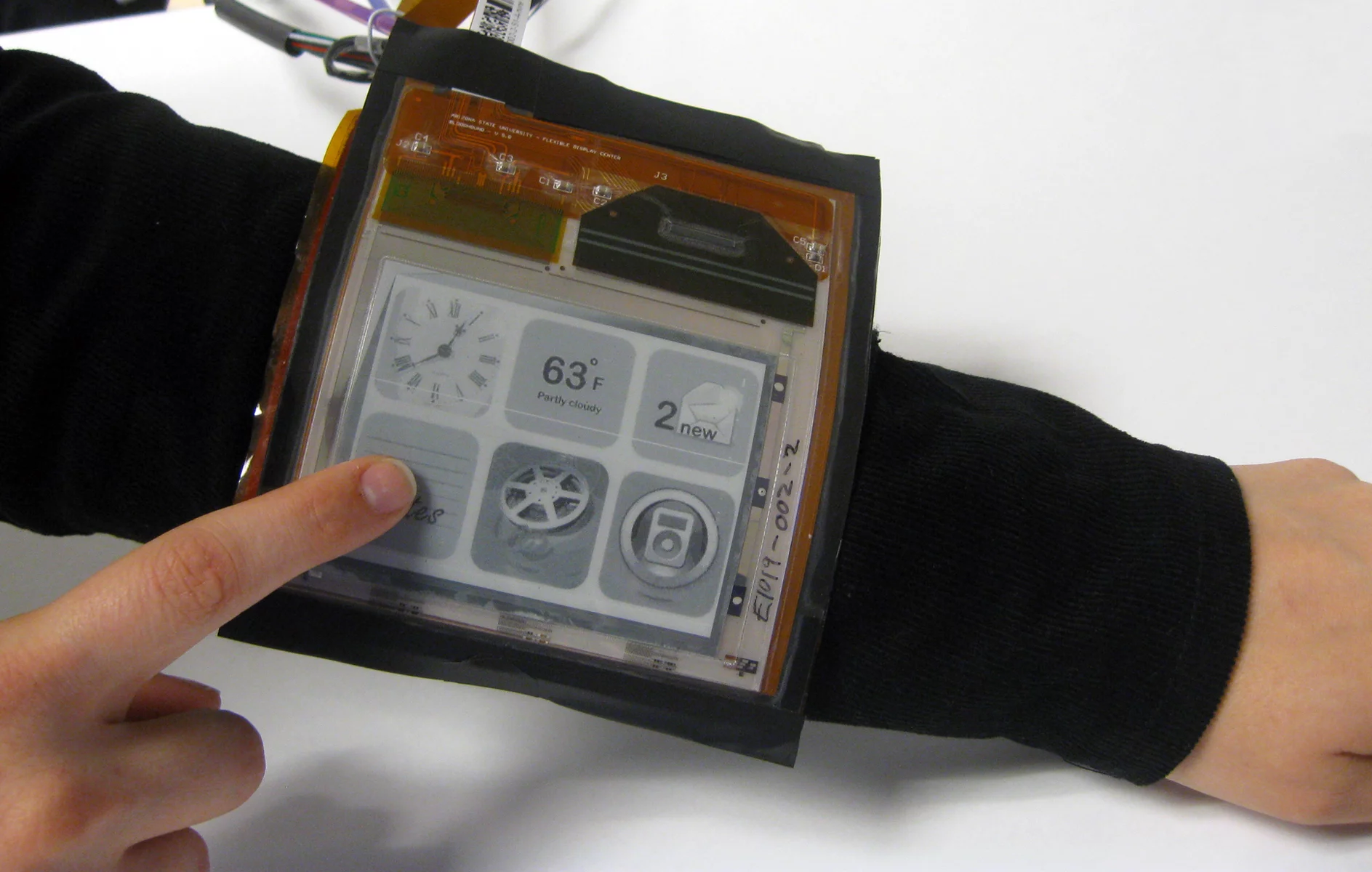 The Paperphone's sister device, the Snaplet wearable computer