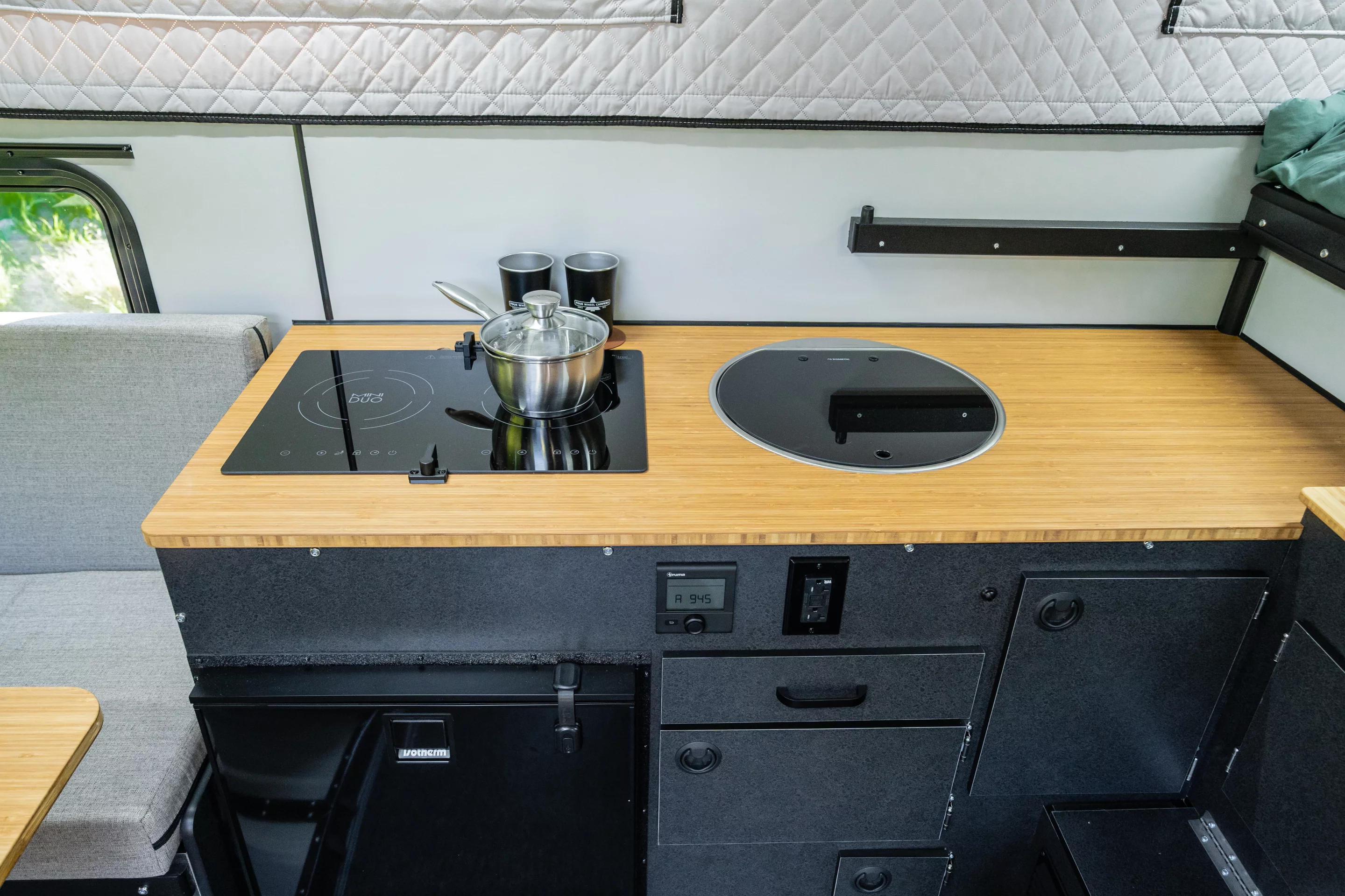 An inbuilt induction cooktop is available as an option but requires the inverter upgrade