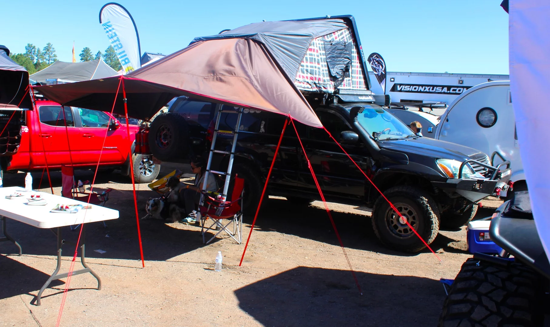iKamper shows the Skycamp expanding hardshell roof-top tent