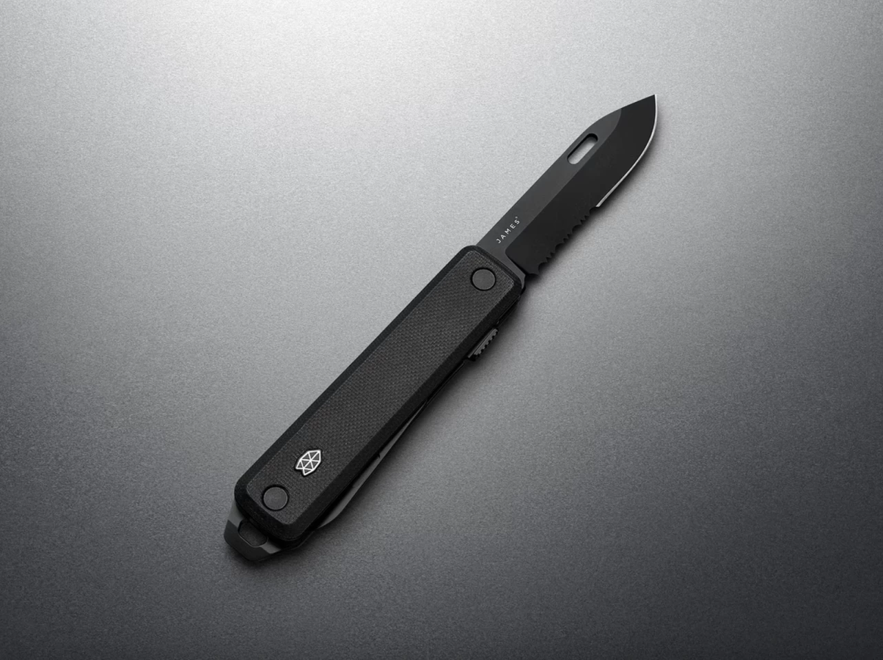 The second-generation Ellis bears the same partially serrated, stainless steel drop-point blade as the original