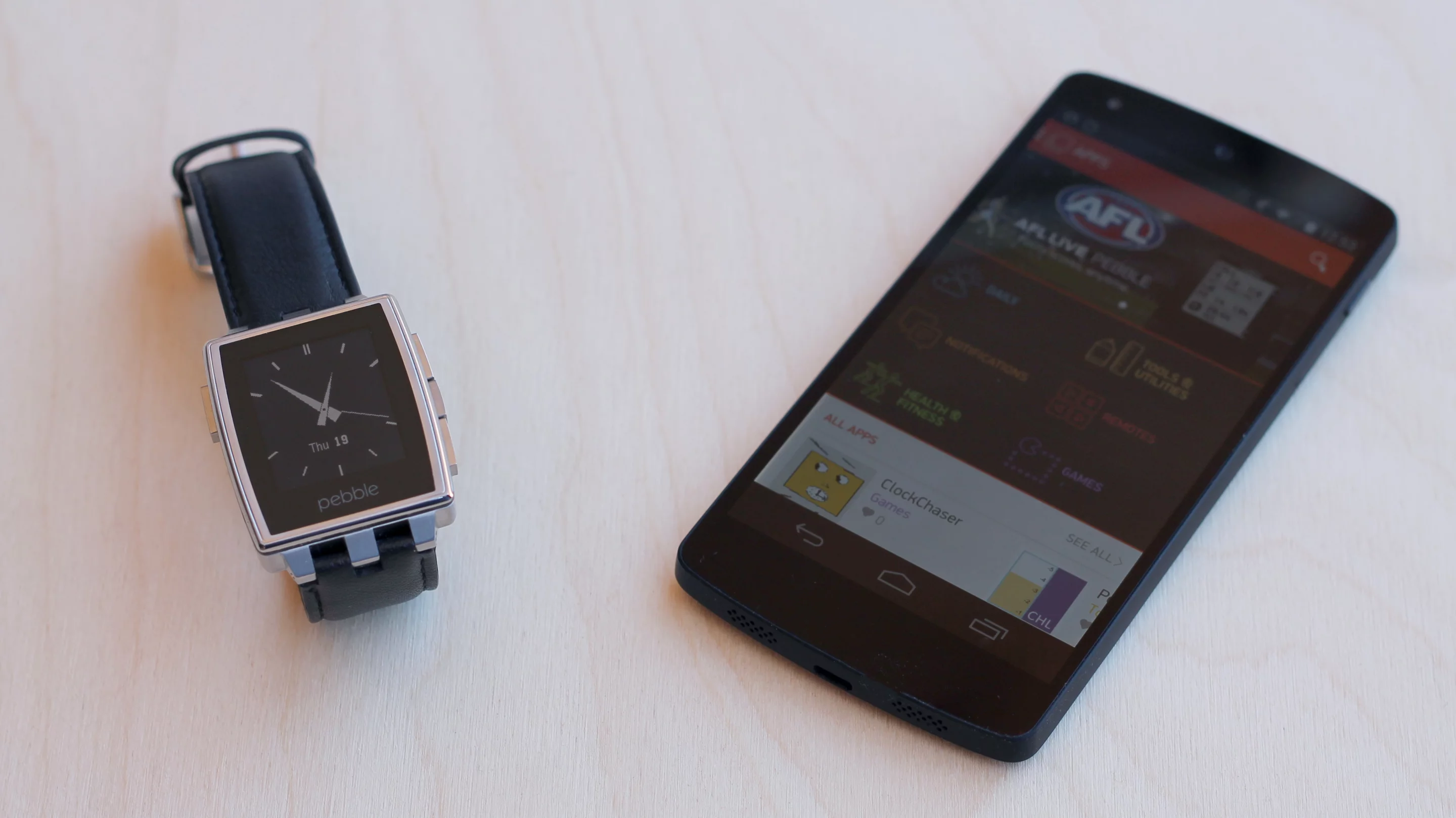 You'll need to pair your Pebble (via Bluetooth) with an iPhone or Android phone