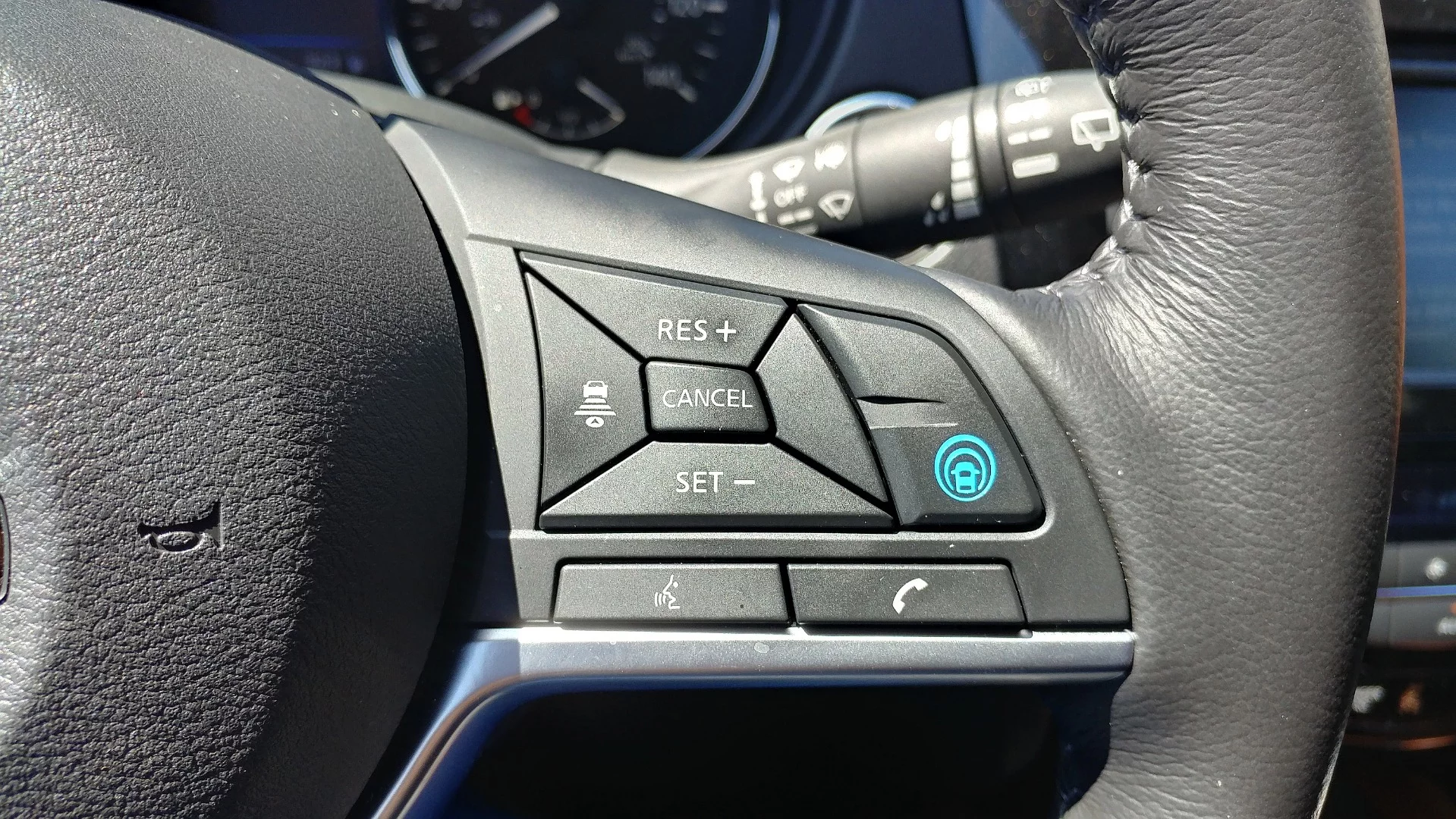 The ProPilot Assist button (in blue) acts as both the cruise control activation button and the ProPilot system toggle