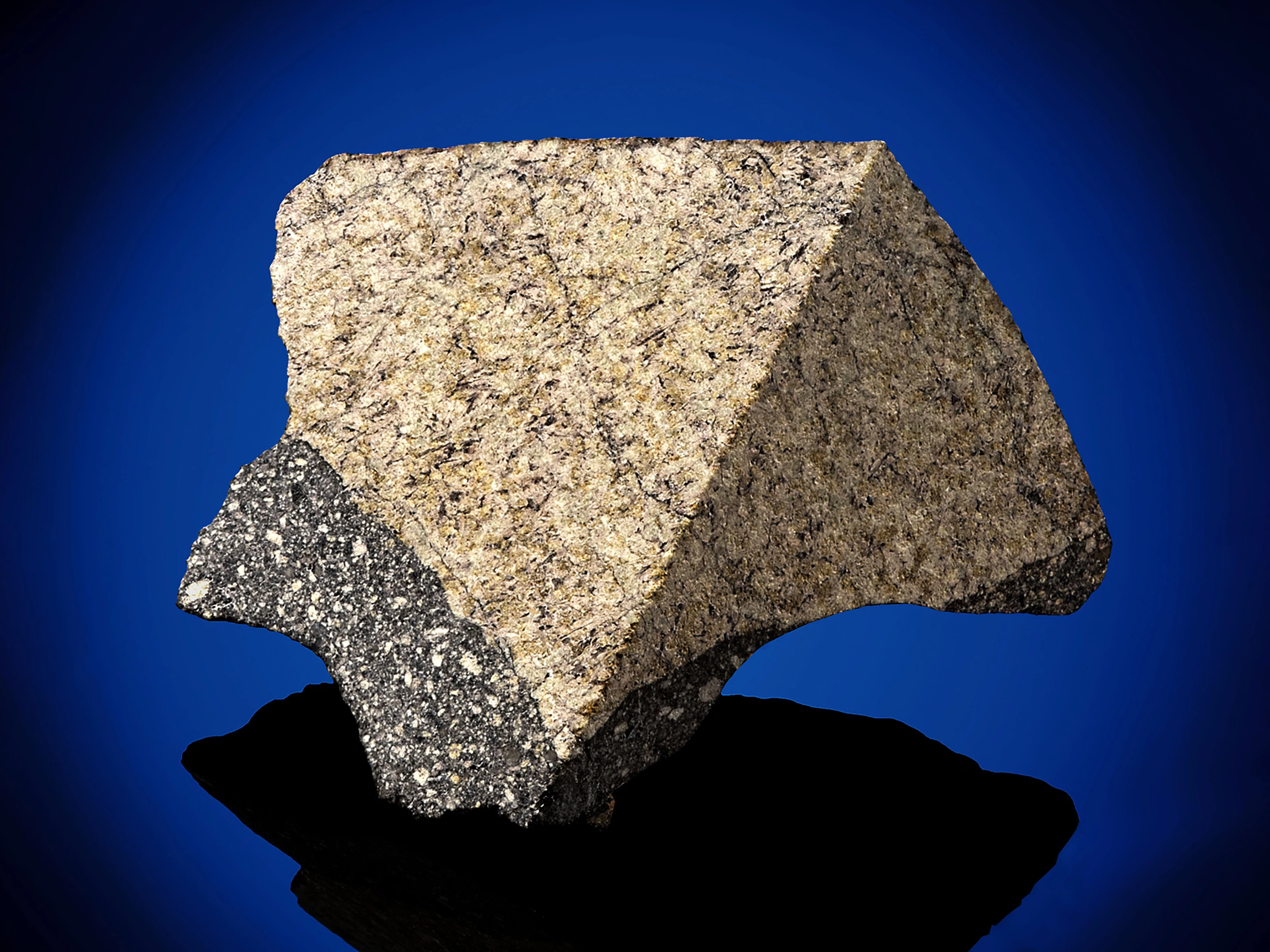 NWA 11616 Moon Rock with visible fusion crust | Sold for: $8,405 (£6,875) by Christie's on May 21, 2020