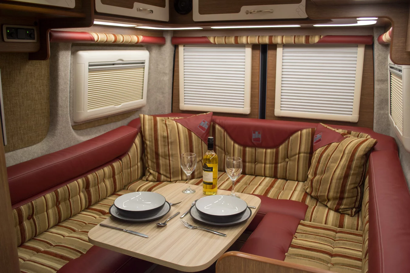 IH offers a roomy rear lounge on the 680CRD camper van