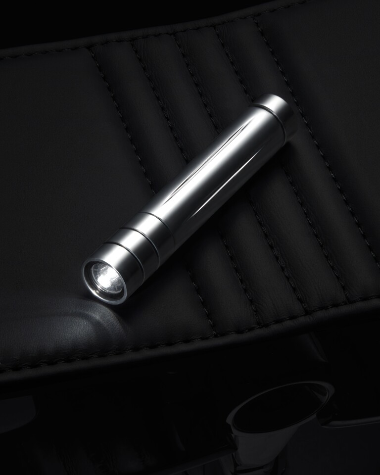A flashlight for nighttime sits