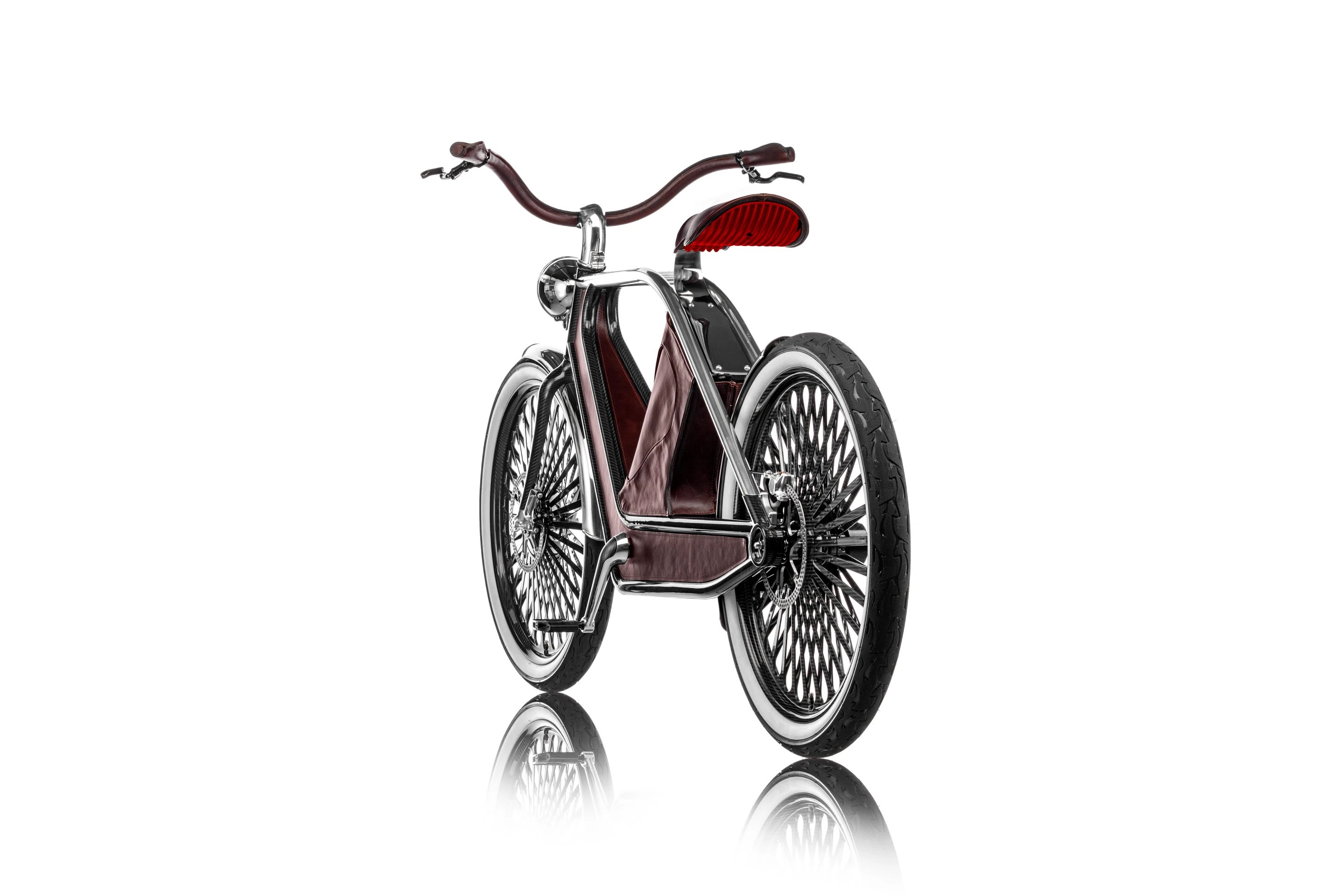 The centrally-mounted electric motor sits on a carbon fiber cradle
