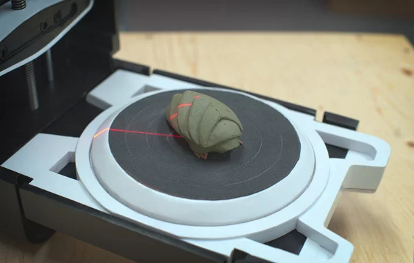 A clay model being scanned by Matterform's Photon 3D scanner