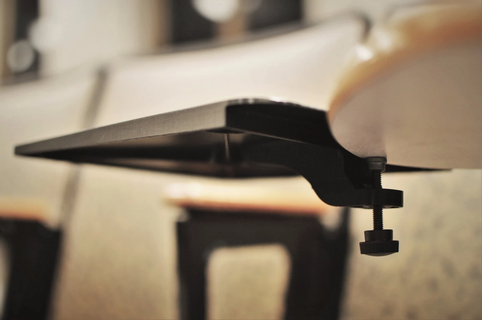 Once a lecture is over, the Desk Buddy can be slipped into the user's bag with their books