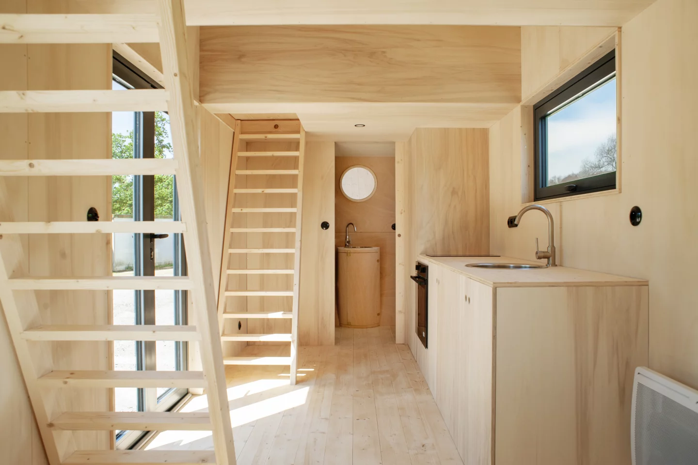 The Grand-Duc's glass doors open onto the home's kitchen