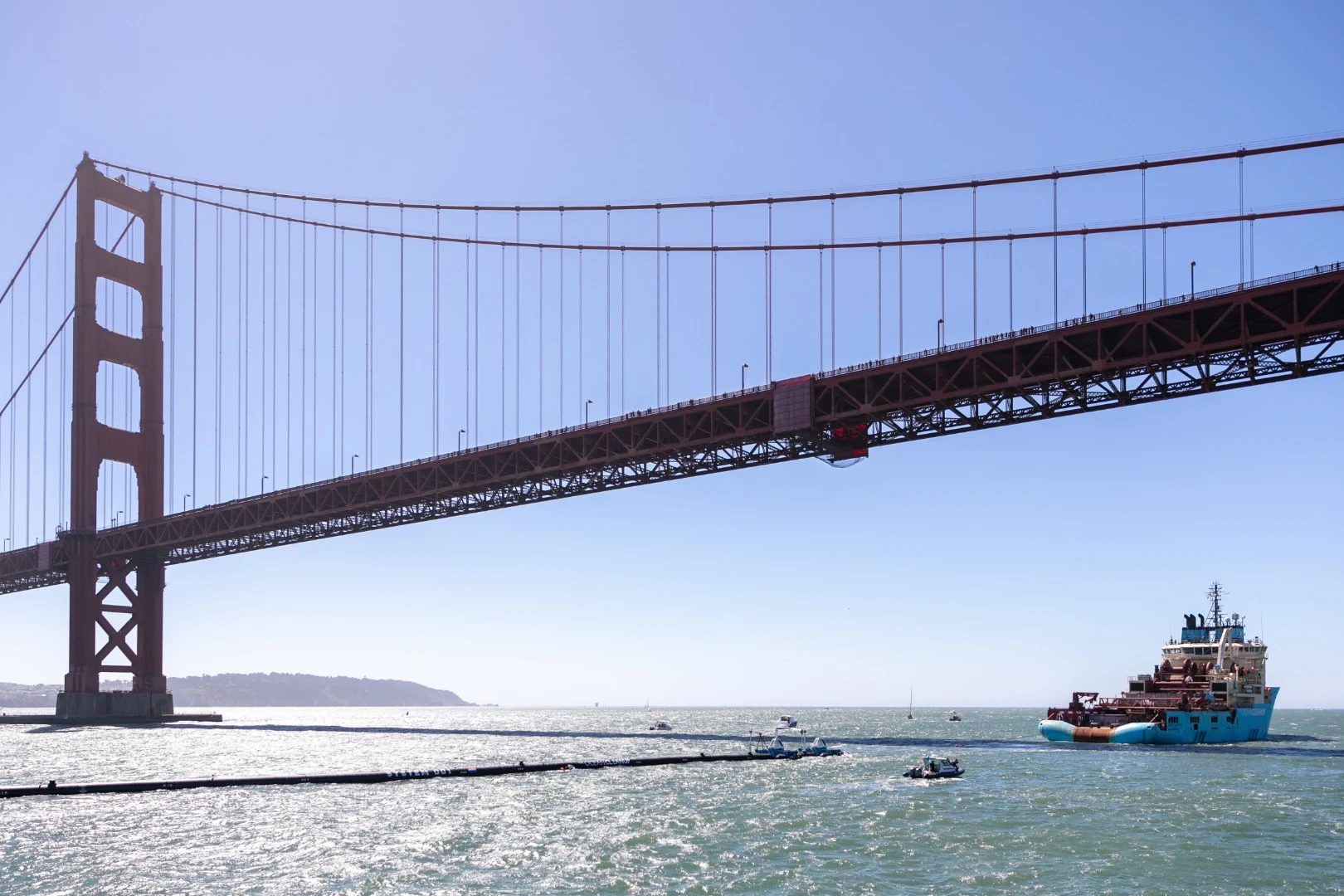 The Ocean Cleanup Project's system is towed out to sea