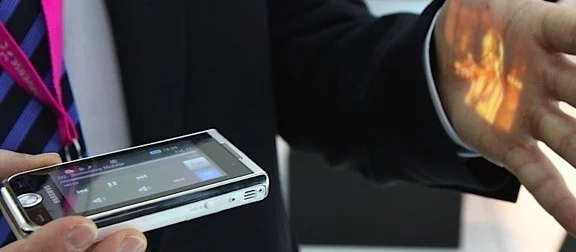 Like this cellphone, cameras from Asia Optical will soon feature TI's DLP Pico projection module