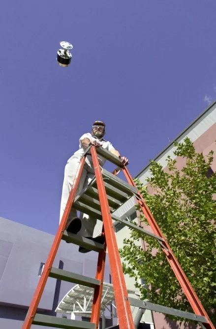 Barry Spletzer of Sandia National Laboratories’ ISRC with the new hopping robot leaping 10-20ft into the air