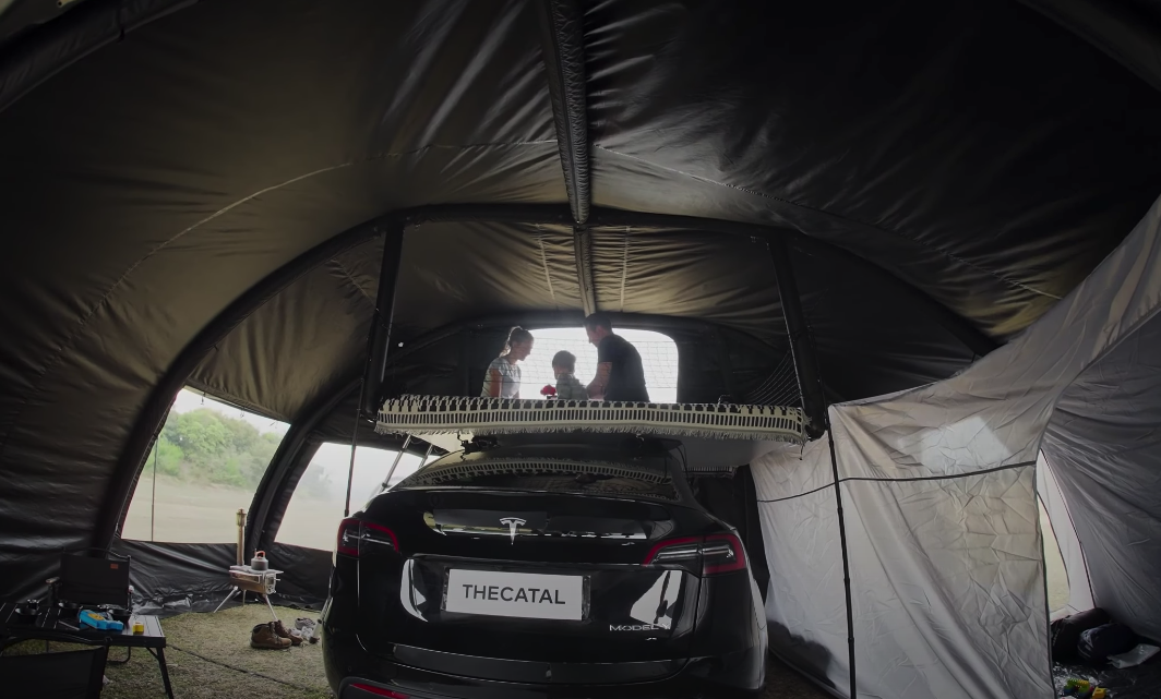The large inflatable rooftop mattress creates a second-story camping experience