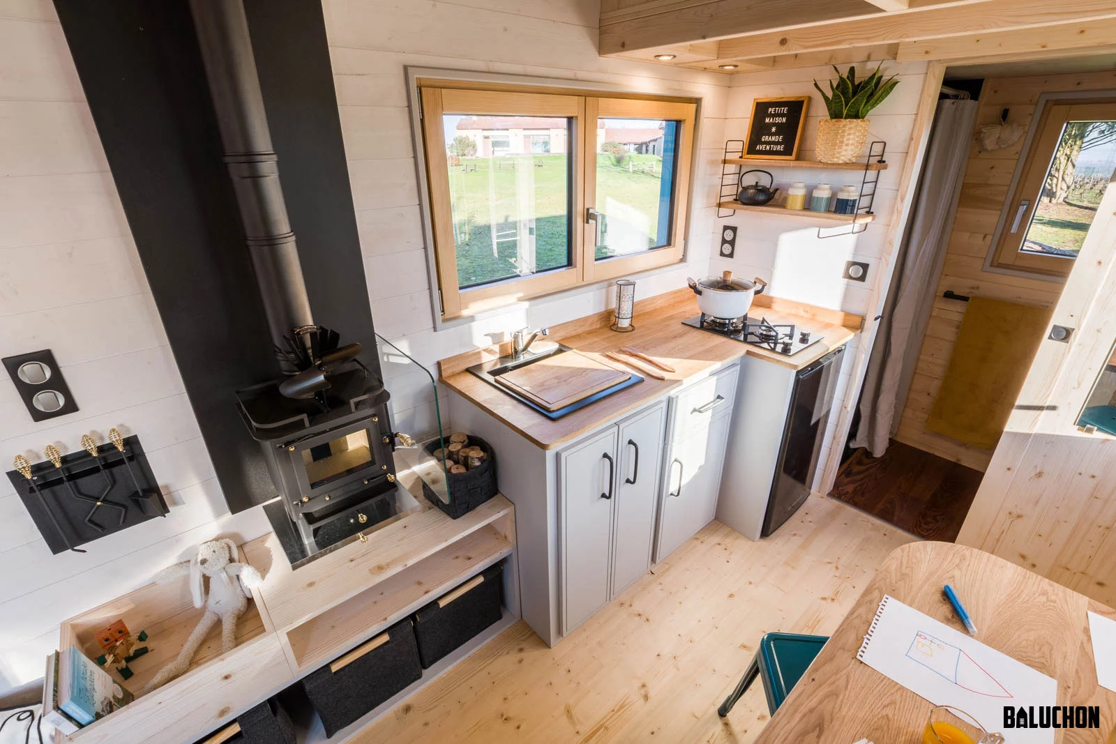 La Maison du Bonheur is heated with a very small wood-burning stove