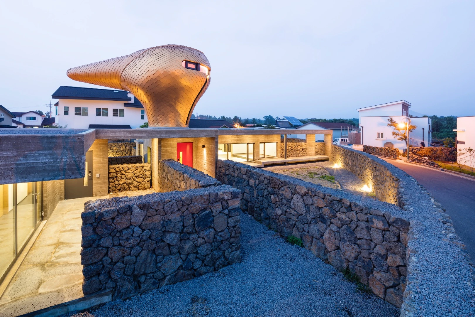 The golden structure is home to bench seating and kitchen, a viewing point, and a bedroom