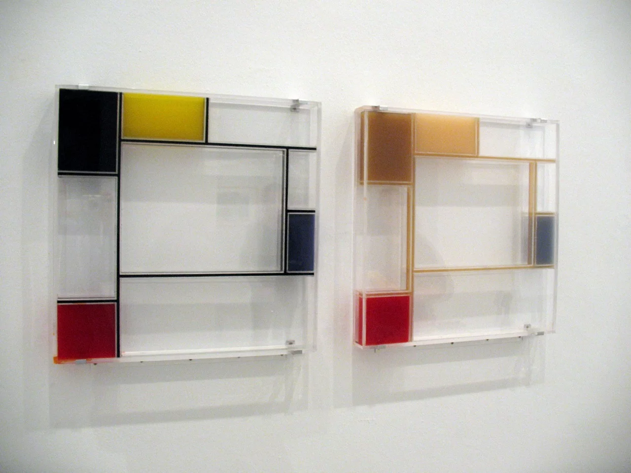 These living works of art inspired by Mondrian paintings decompose as they are exhibited. At the beginning of the exhibition the work on the right was infected with a pigment eating bacteria causing the image to degrade during the exhibition
